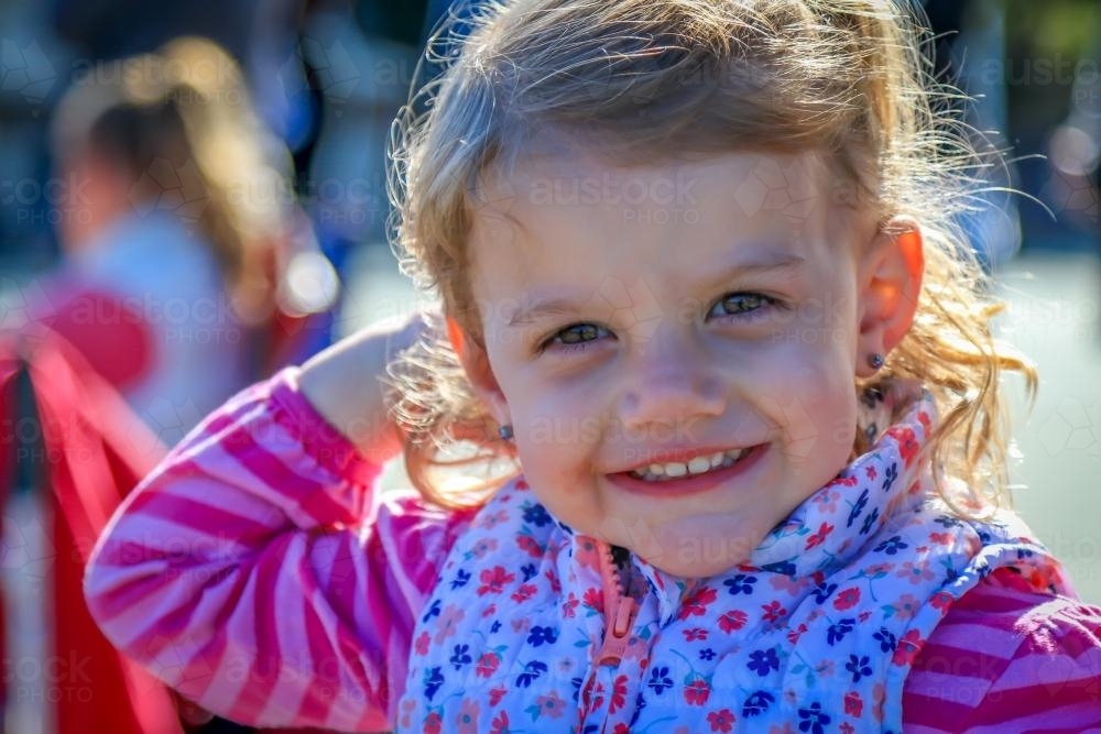 close up of young girl smiling - Australian Stock Image