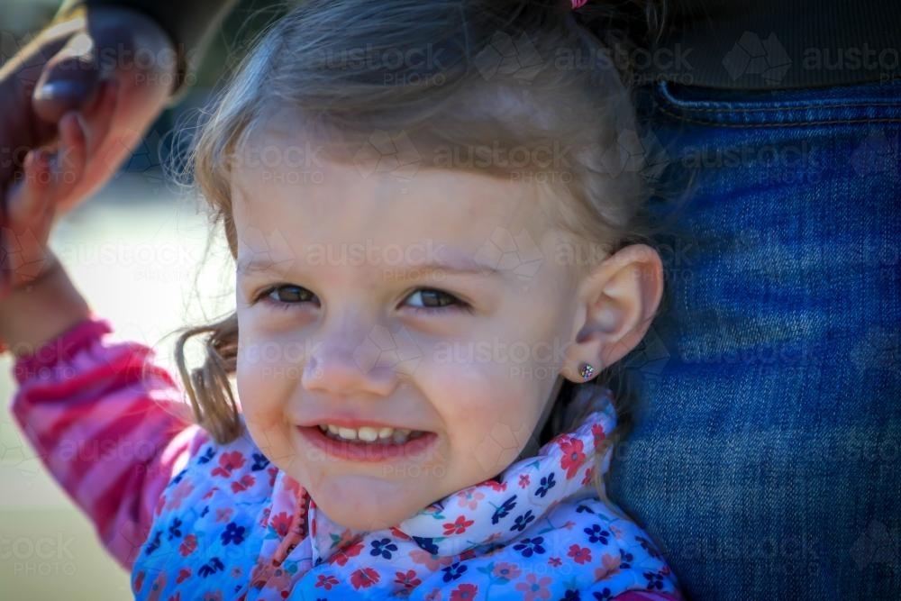 close up of young girl smiling - Australian Stock Image