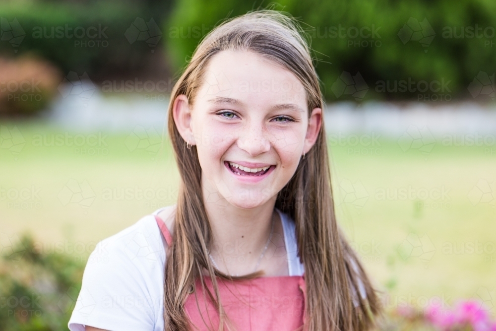 Close up of young girl smiling - Australian Stock Image