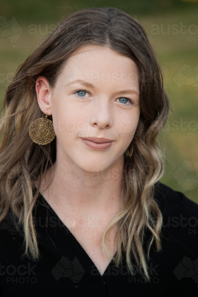 Close up portrait of a beautiful teen girl outside - Australian Stock Image