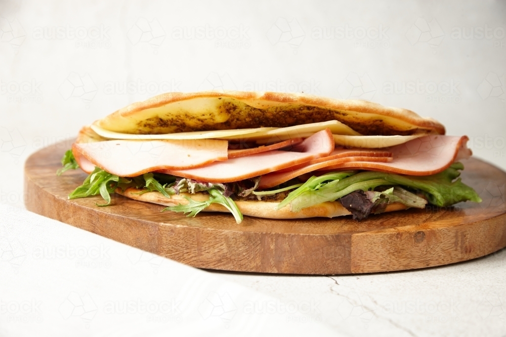 Image of close up shot of a ham and cheese zaatar Austockphoto
