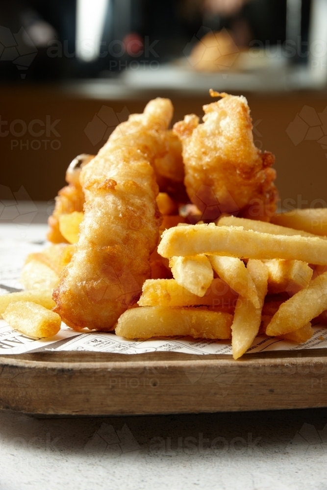 Close up shot of fish and chips : Austockphoto Close up shot of fish and chips - Australian Stock Image