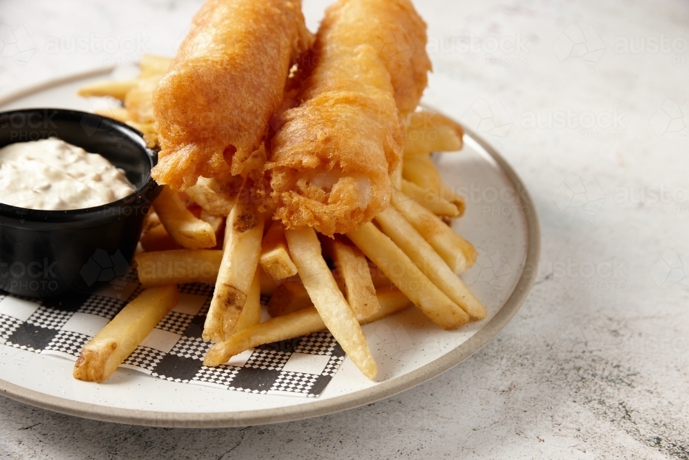 Image of close up shot of fish and chips with buttermilk ranch dipping