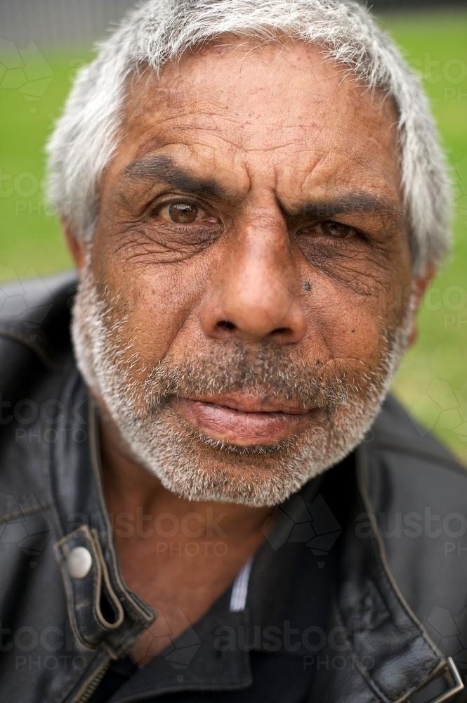 Closeup of Aboriginal Man in Leather Jacket - Australian Stock Image