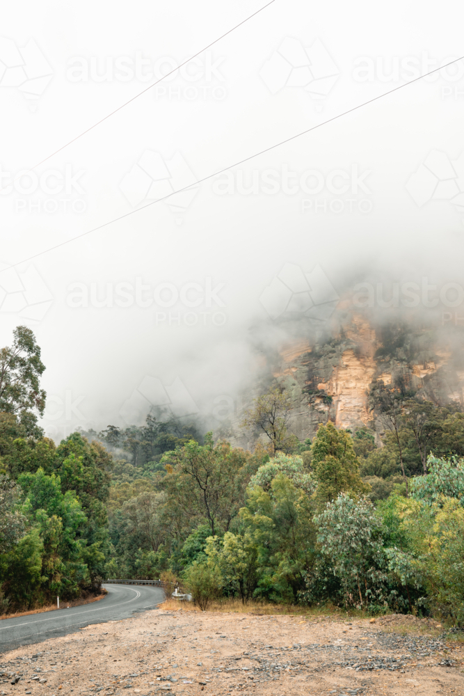 Clouds passing over mountain range along the Bylong Valley Way in regional NSW - Australian Stock Image