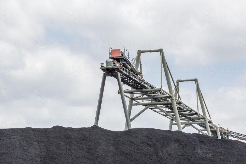 Coal mine conveyor transporting material to a stockpile in NSW Australia. - Australian Stock Image