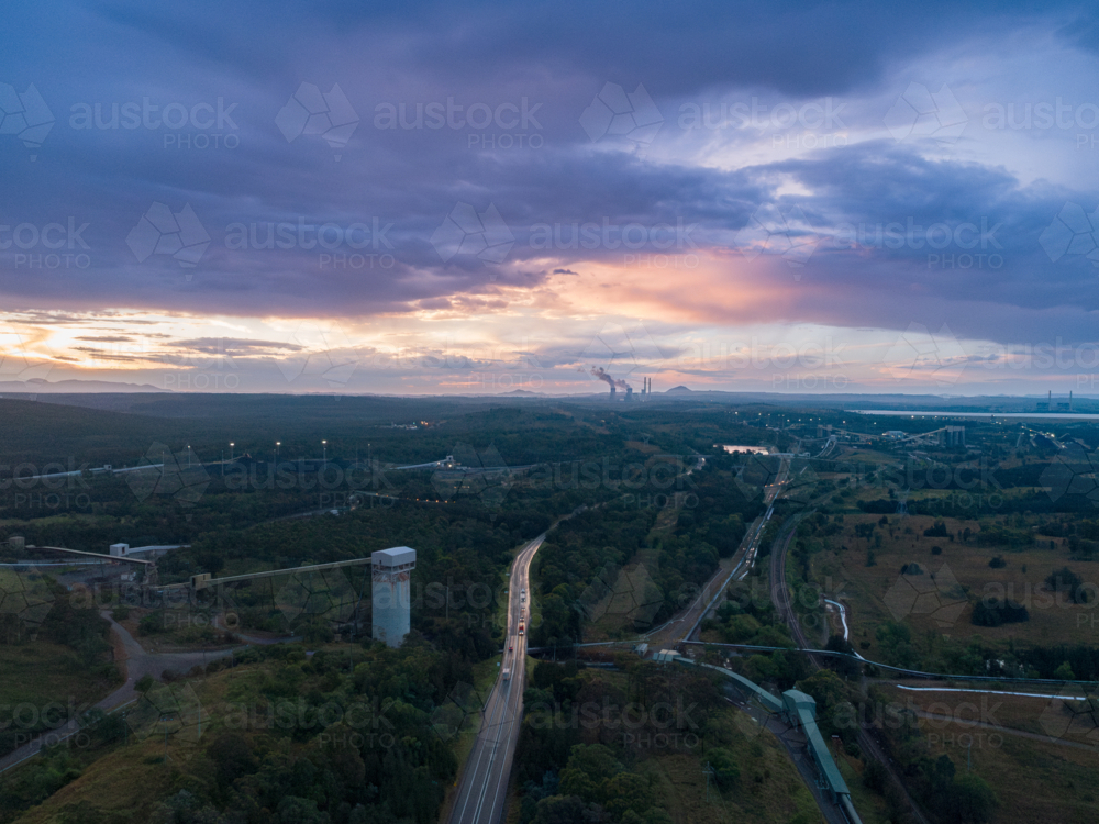 Coal mining and export infrastructure with coal fired power station on horizon - Australian Stock Image