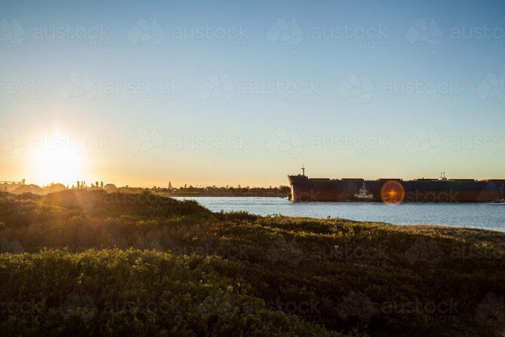 Coal ship coming into Newcastle Harbour - Australian Stock Image