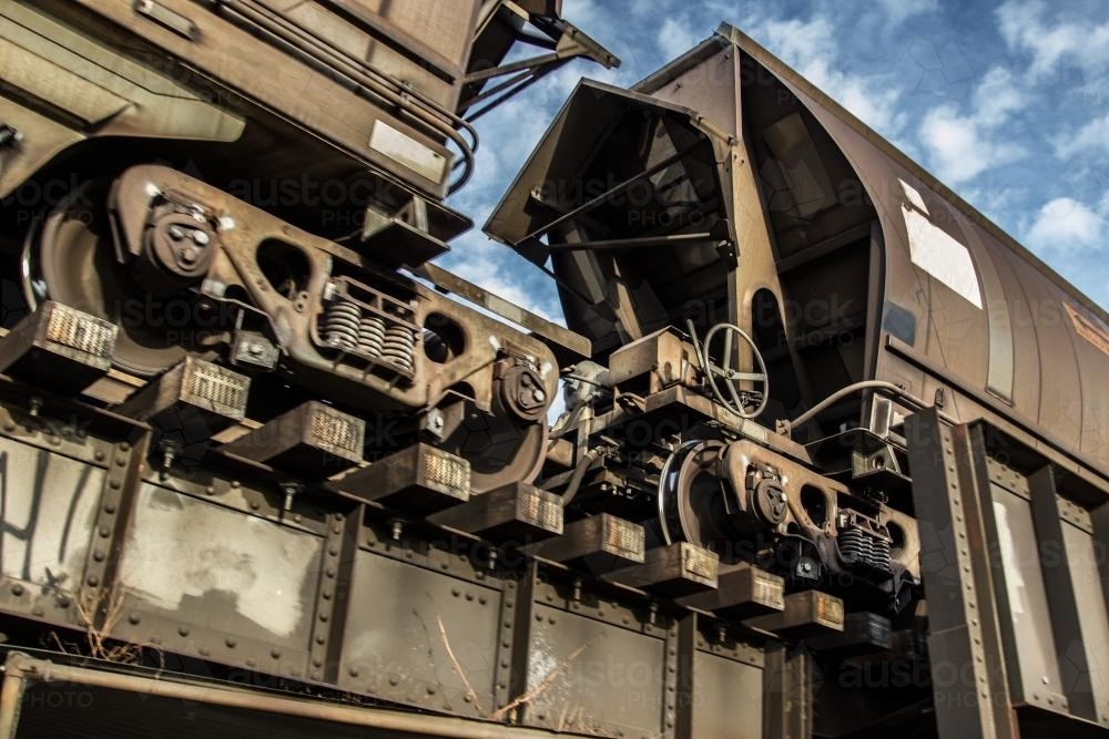 Coal trains hauling coal and crossing a bridge - Australian Stock Image