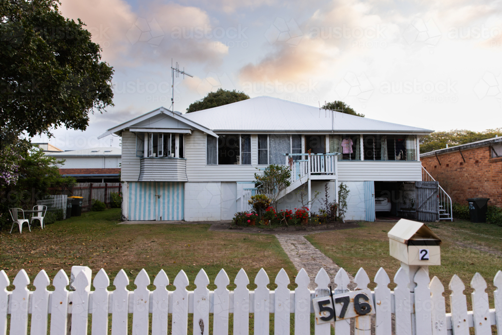 coastal beach house on a big block in the afternoon light - Australian Stock Image