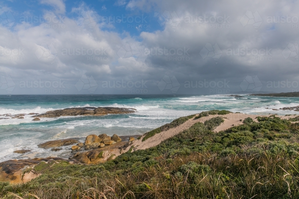 Coastline on a winter's day with clouds and the ocean - Australian Stock Image
