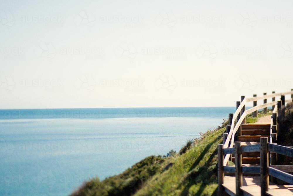Coastline walkway on a mountain overlooking the ocean - Australian Stock Image