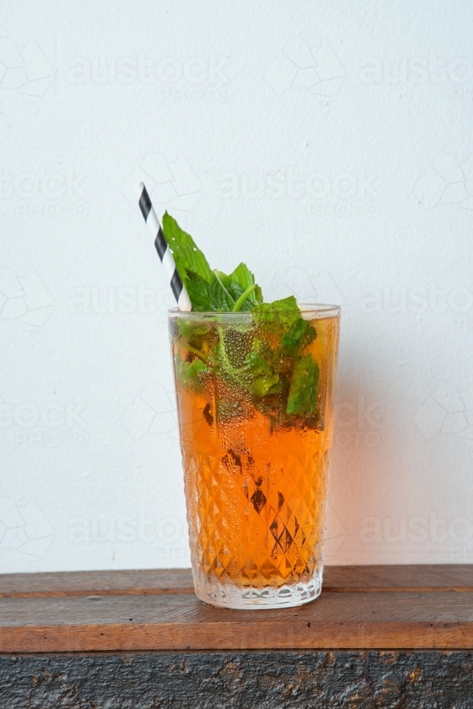 cocktail with crushed ice, and fresh mint. - Australian Stock Image
