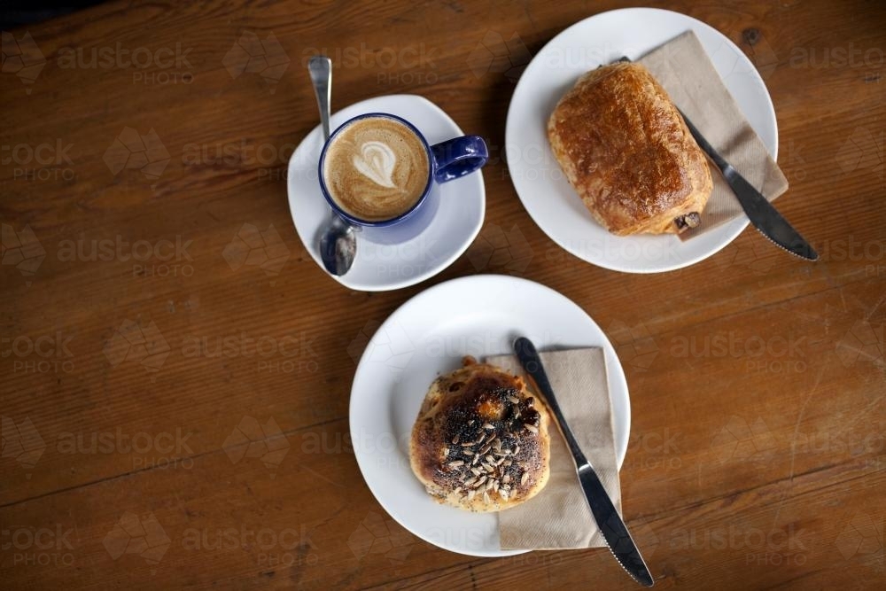 Coffee and pastries on a table - Australian Stock Image