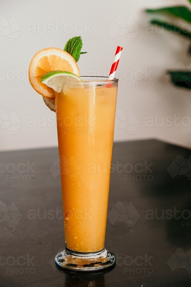 Cold drink with straw. - Australian Stock Image