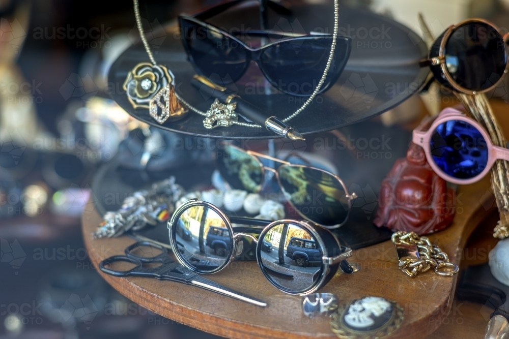 Collection of ornate objects in shop front - Australian Stock Image