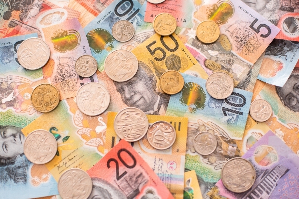 colourful Australian money background with notes and coins - Australian Stock Image