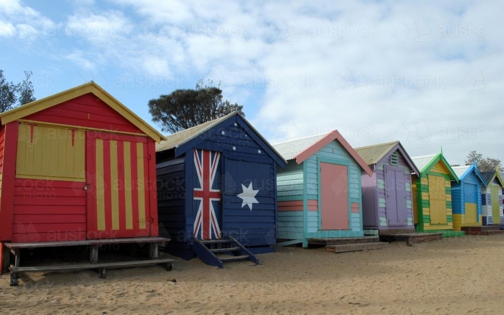 Colourful bathing boxes at Dendy Street Beach - Australian Stock Image