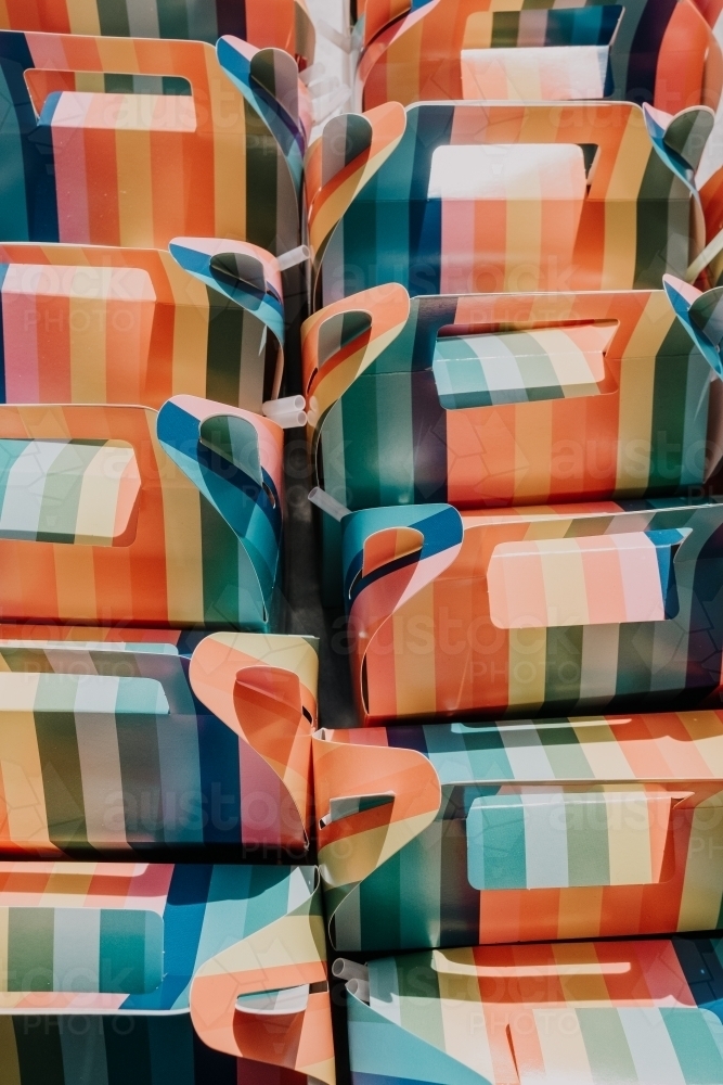 Colourful boxes of party favours from above. - Australian Stock Image