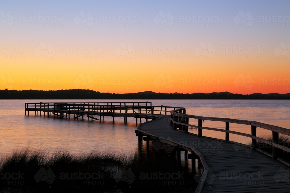 Colourful dusk over the boardwalk at Lake Clifton - Australian Stock Image