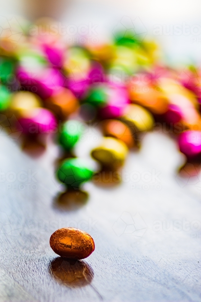 Colourful Easter eggs on wood - Australian Stock Image