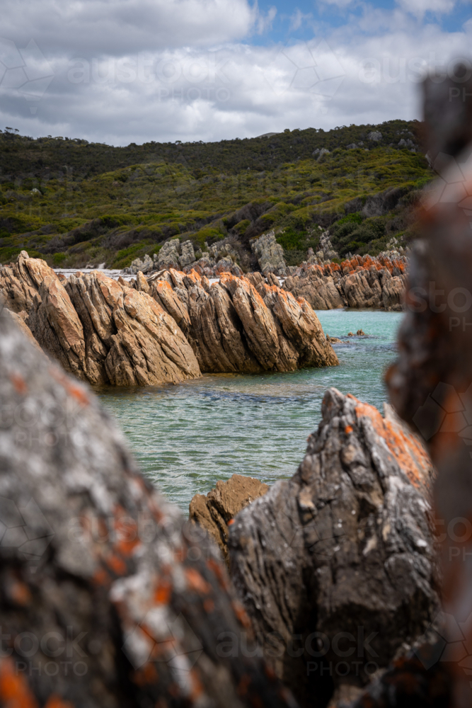 Colourful rocks and shore of the Rocky Cape National Park - Australian Stock Image