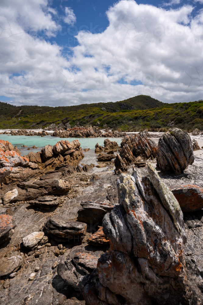 Colourful rocks and shore of the Rocky Cape National Park - Australian Stock Image