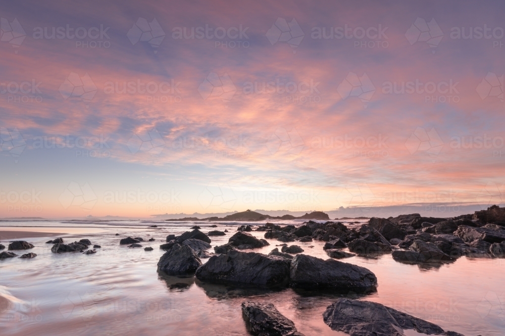 Colourful sunrise at Sawtell Beach - Australian Stock Image