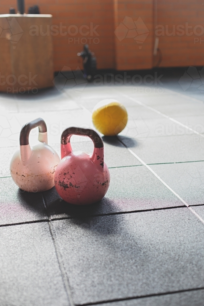 Colourful weights in an indoor gym - Australian Stock Image