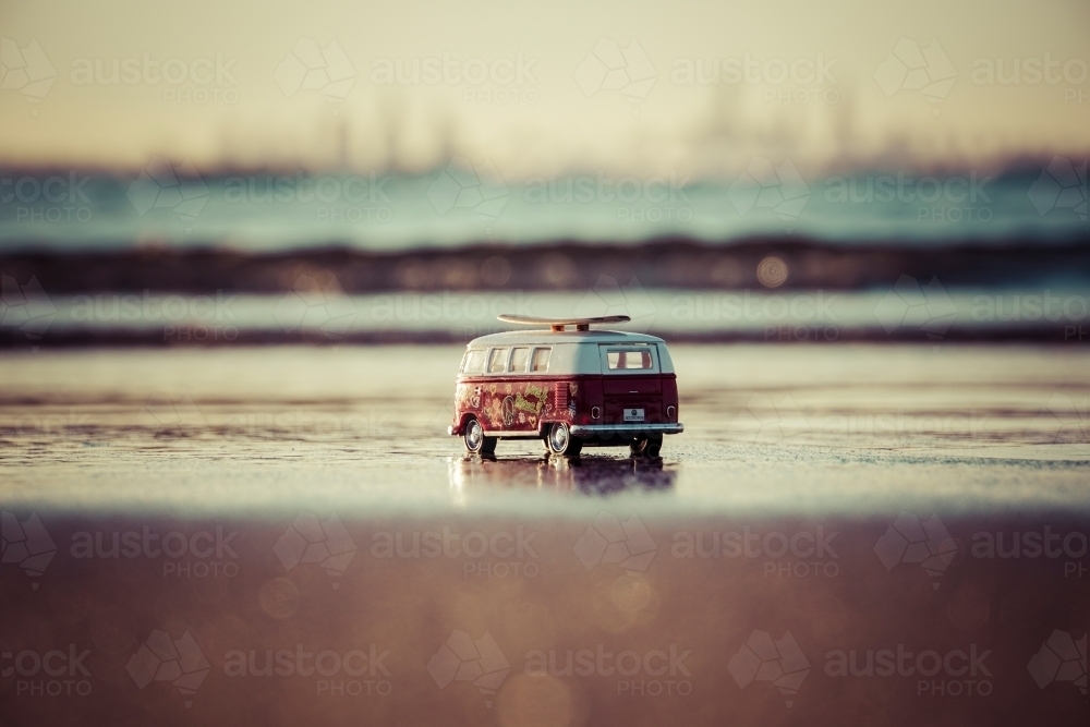 Combi van miniature on beach - Australian Stock Image