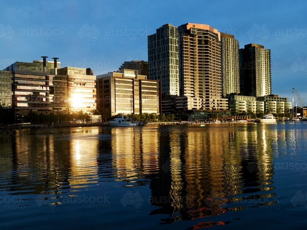 Commercial Buildings Glowing in Evening Sun in Docklands, Victoria - Australian Stock Image