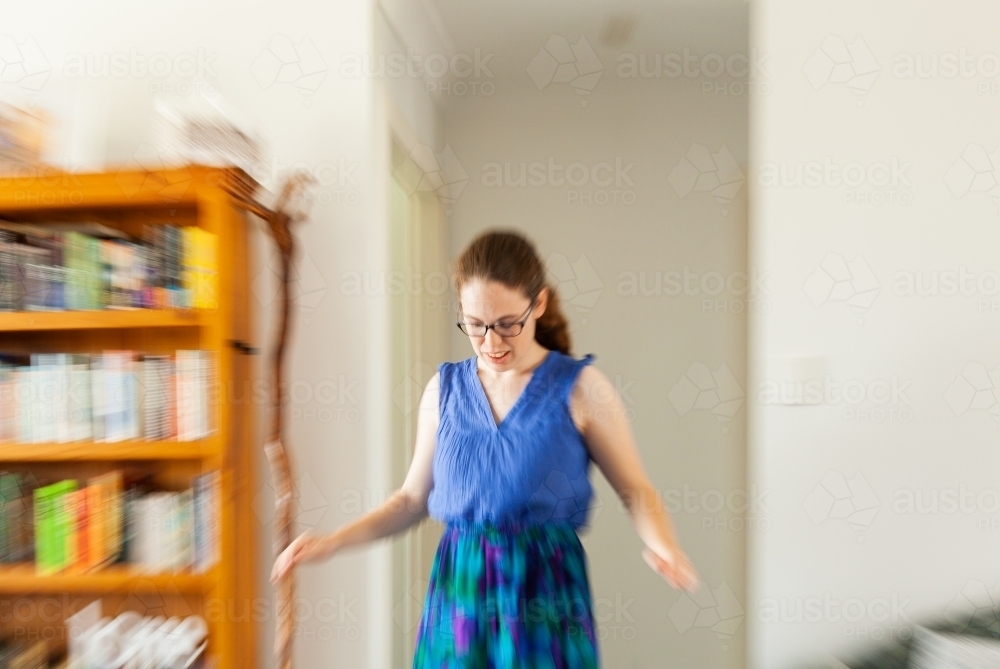 Concept - vertigo, spinning, dizziness person trying to stay upright and keep balance - Australian Stock Image