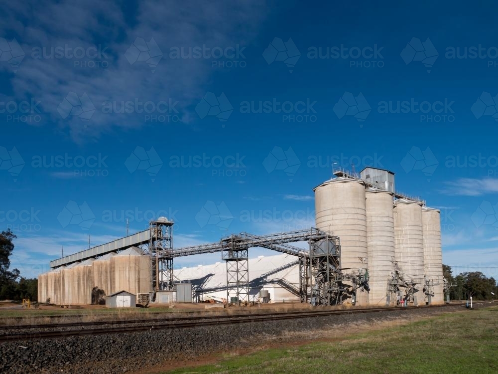 Concrete grain silos and buildings : Austockphoto Concrete grain silos and buildings - Australian Stock Image