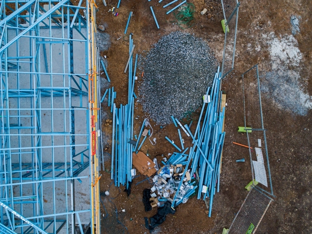 Concrete slab & metal framework of residential house under construction - Australian Stock Image