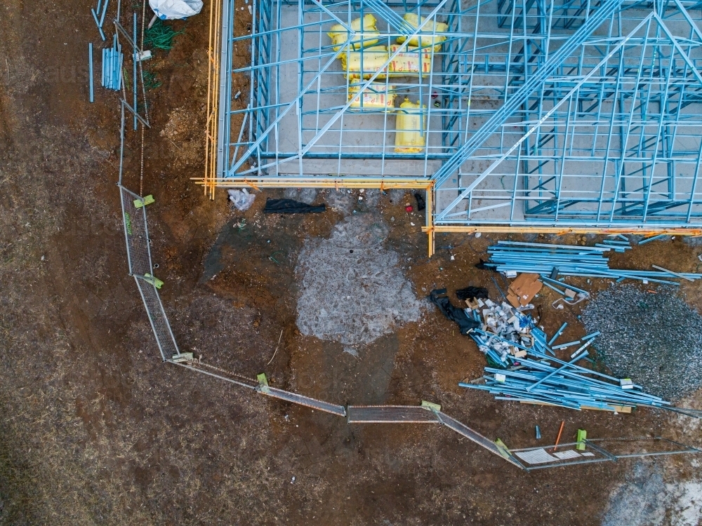 Concrete slab & metal framework of residential house under construction - Australian Stock Image