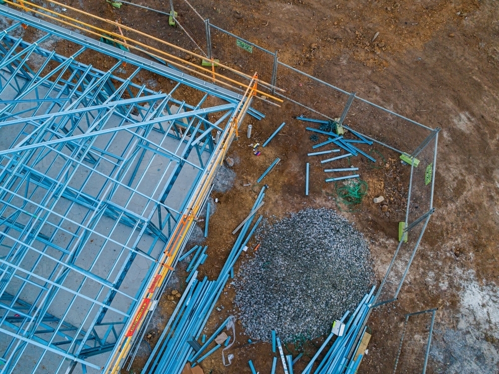 Concrete slab & metal framework of residential house under construction - Australian Stock Image