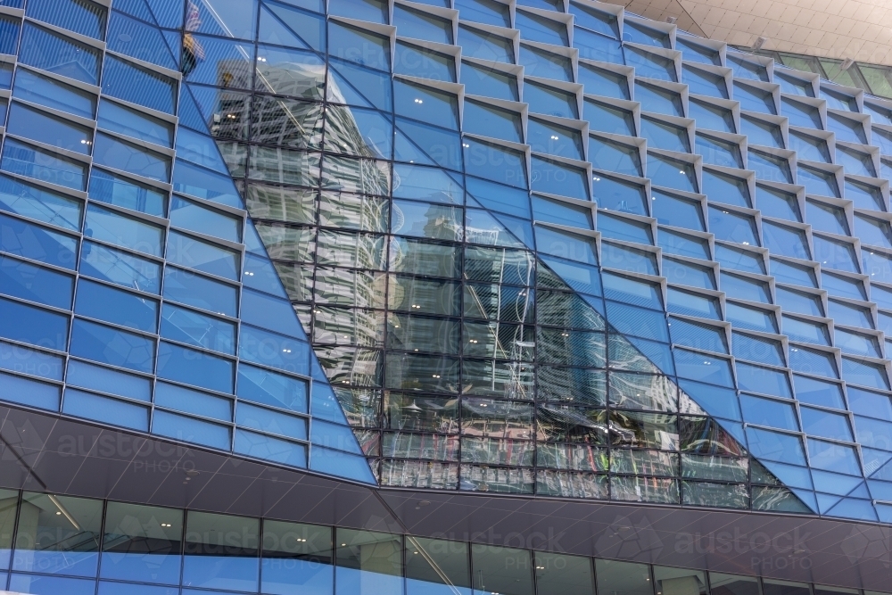 Contemporary modern style architecture with reflection of Sydney cityscape - Australian Stock Image