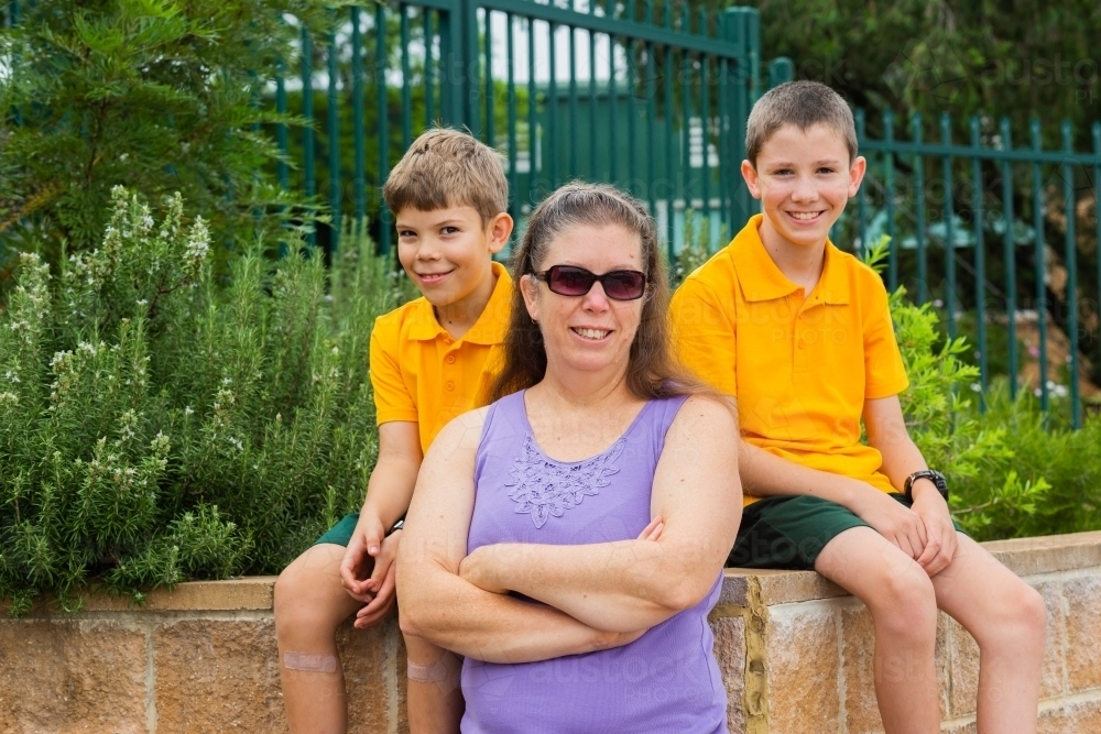 Cool school mum and her boys - Australian Stock Image