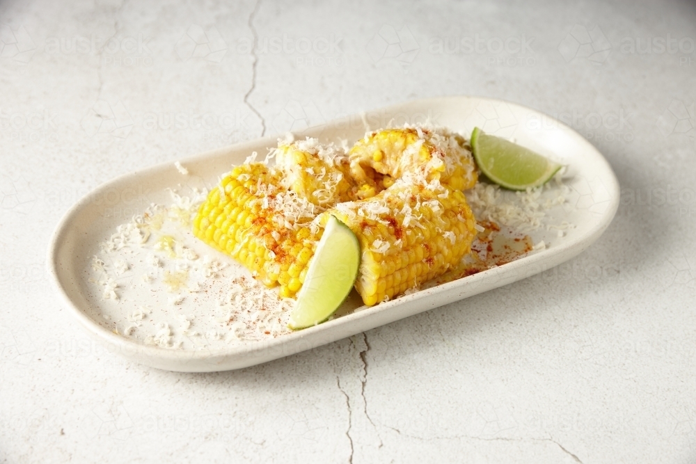 Corn and fresh lime butter manchego dish - Australian Stock Image