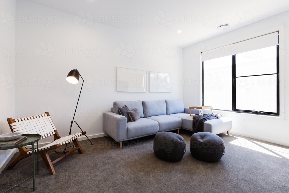 Cosy tv sitting or second living room in a new home - Australian Stock Image