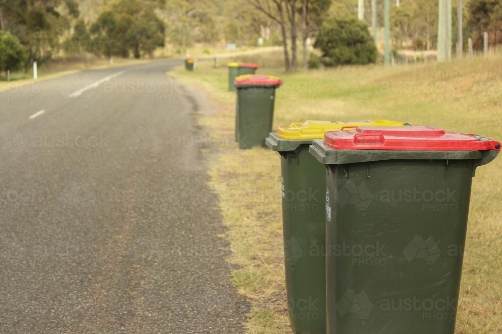 Image of Council bins by the side of a rural road Austockphoto