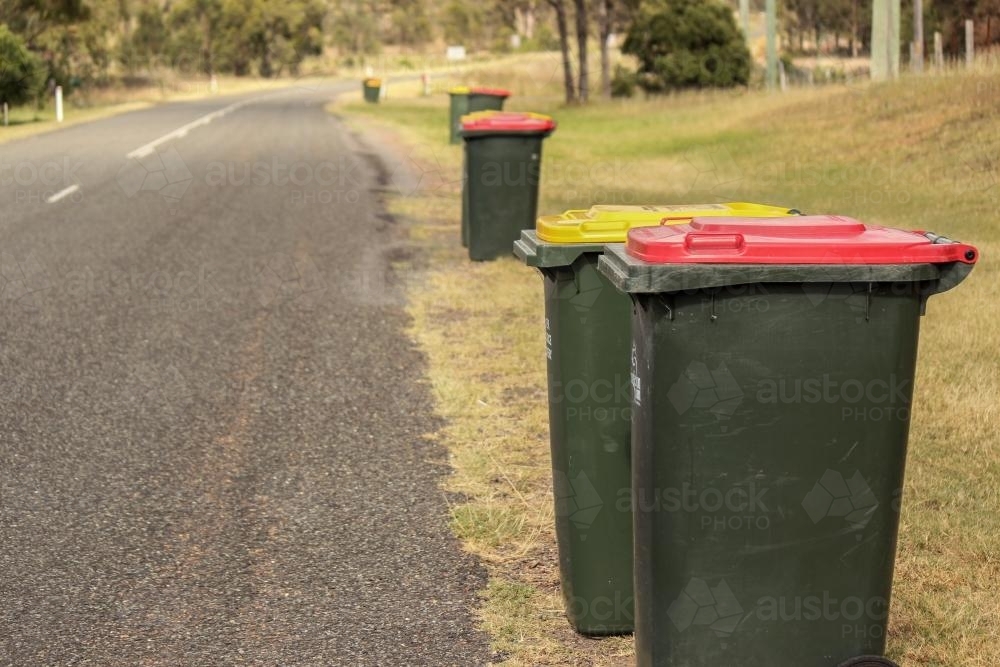 Image of Council bins by the side of a rural road Austockphoto