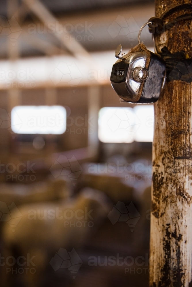 Counter attached to post in shearing shed - Australian Stock Image