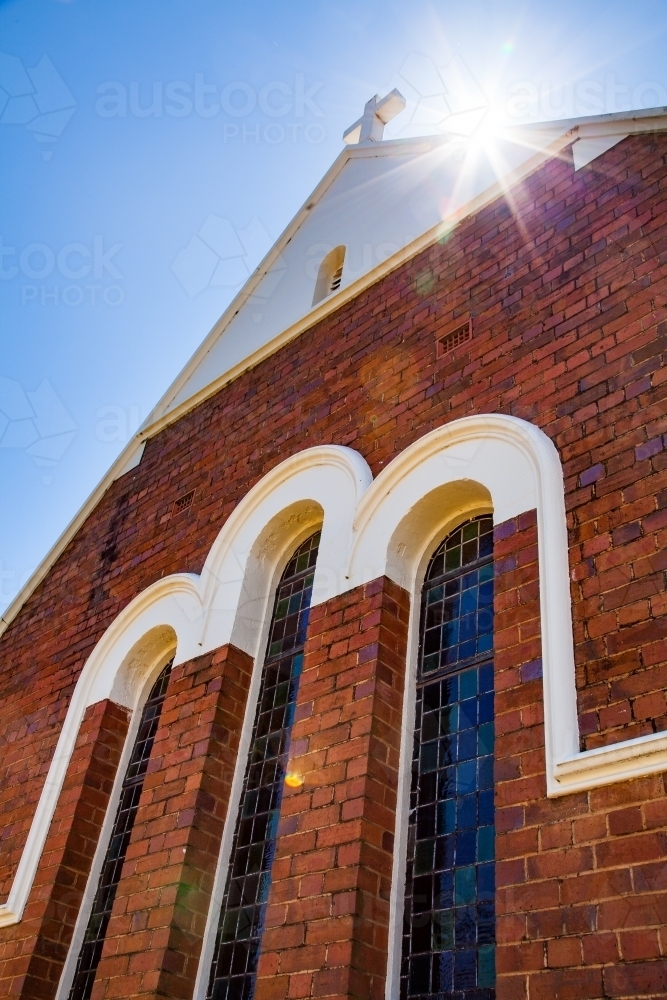 Country Church with sunlight shining over the roof - Australian Stock Image