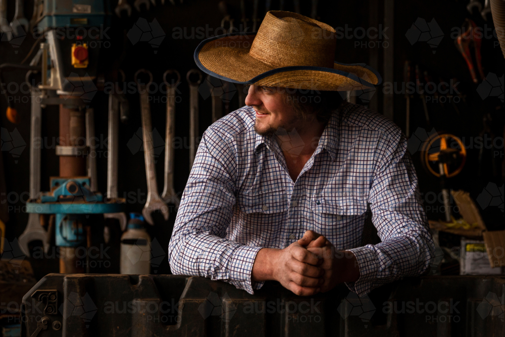 Country farmer in his shed - Australian Stock Image
