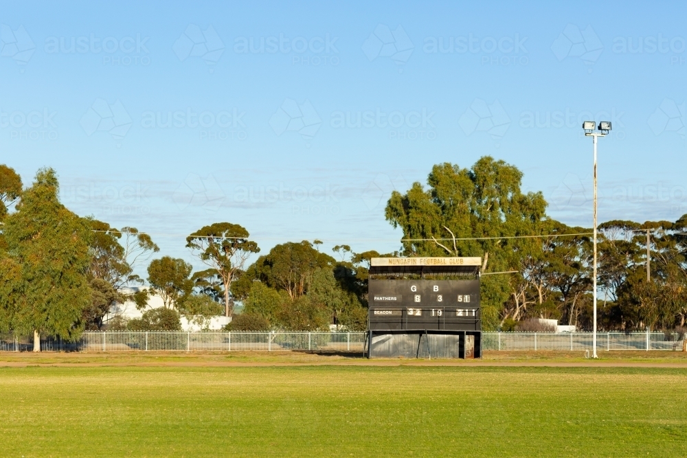 country football oval with scoreboard - Australian Stock Image