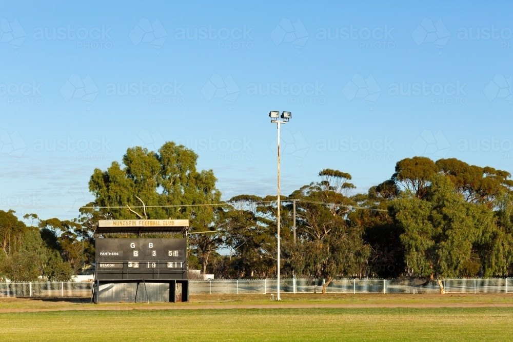 country football oval with scoreboard - Australian Stock Image