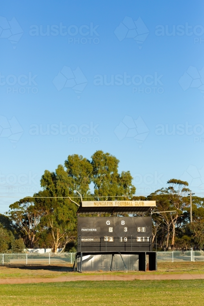 country football oval with scoreboard - Australian Stock Image