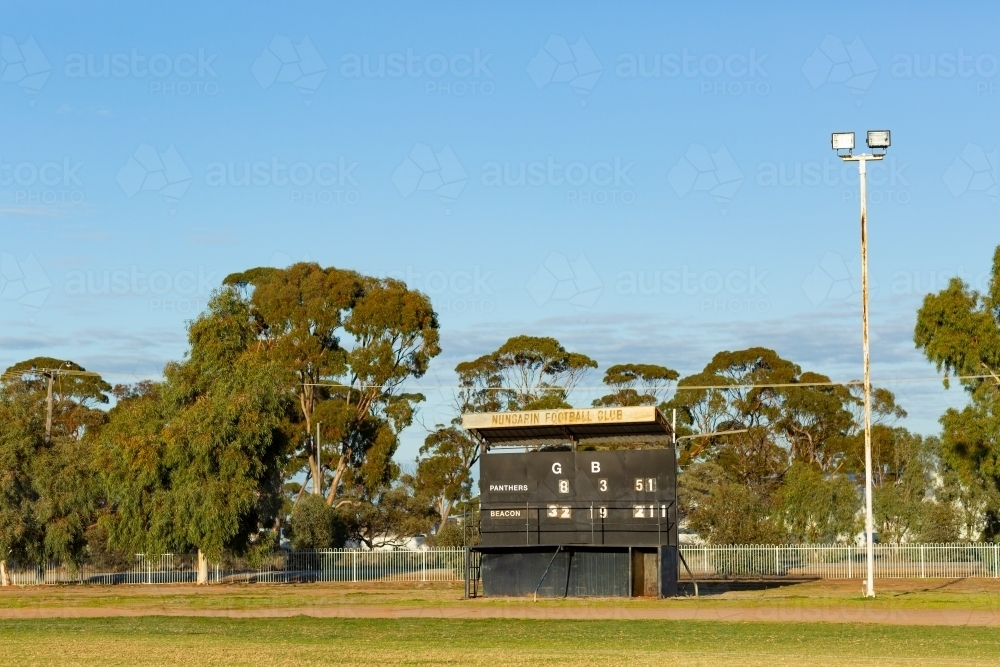 country football oval with scoreboard - Australian Stock Image