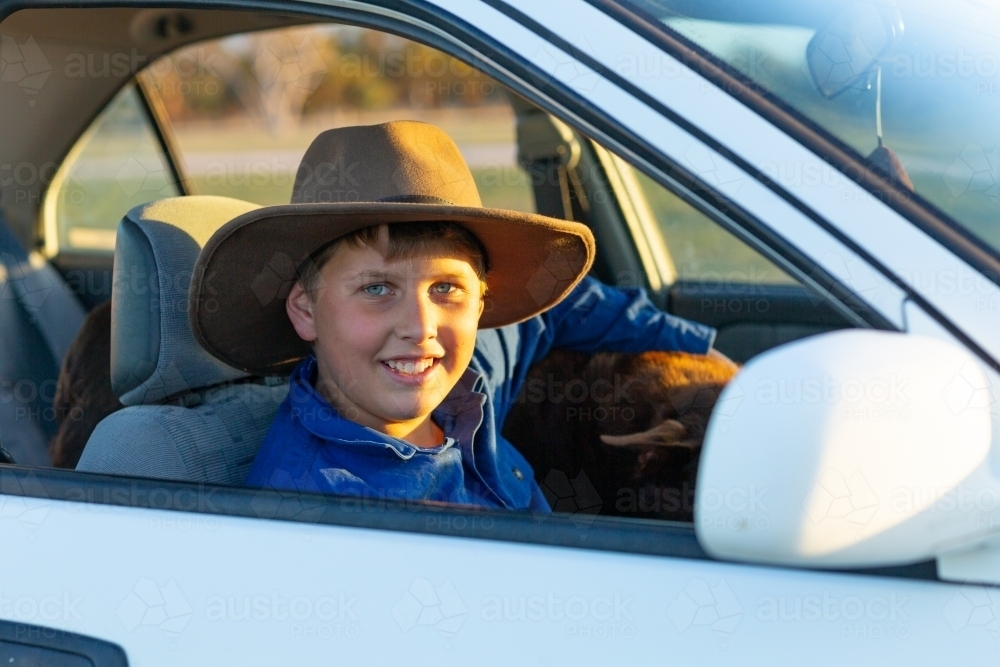 country kid in car - Australian Stock Image